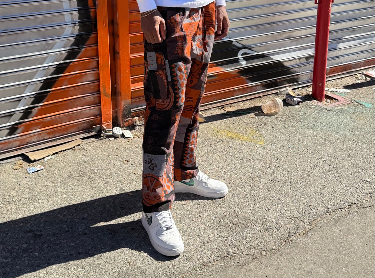 Orange printed cotton cargo pants — fit and detail