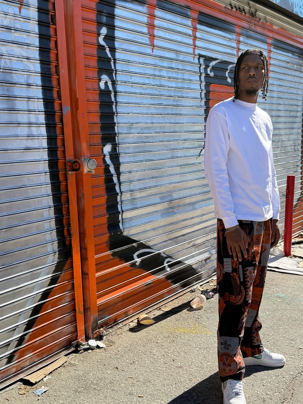 Orange printed cotton cargo pants — fit and detail