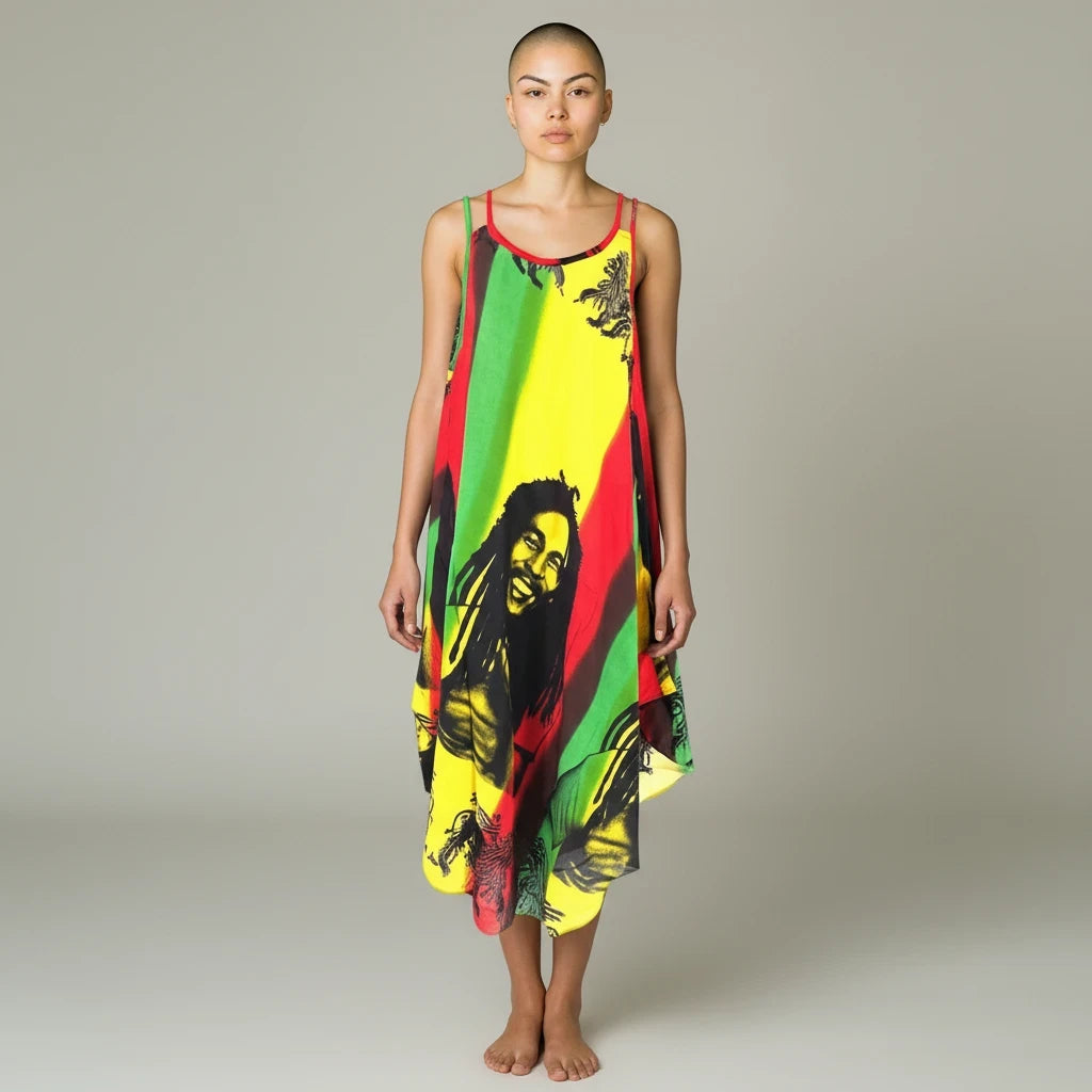 Model wearing a Teranga Africa/Choose Senegal flowy rayon Rasta dress with vibrant red, yellow, and green colors.