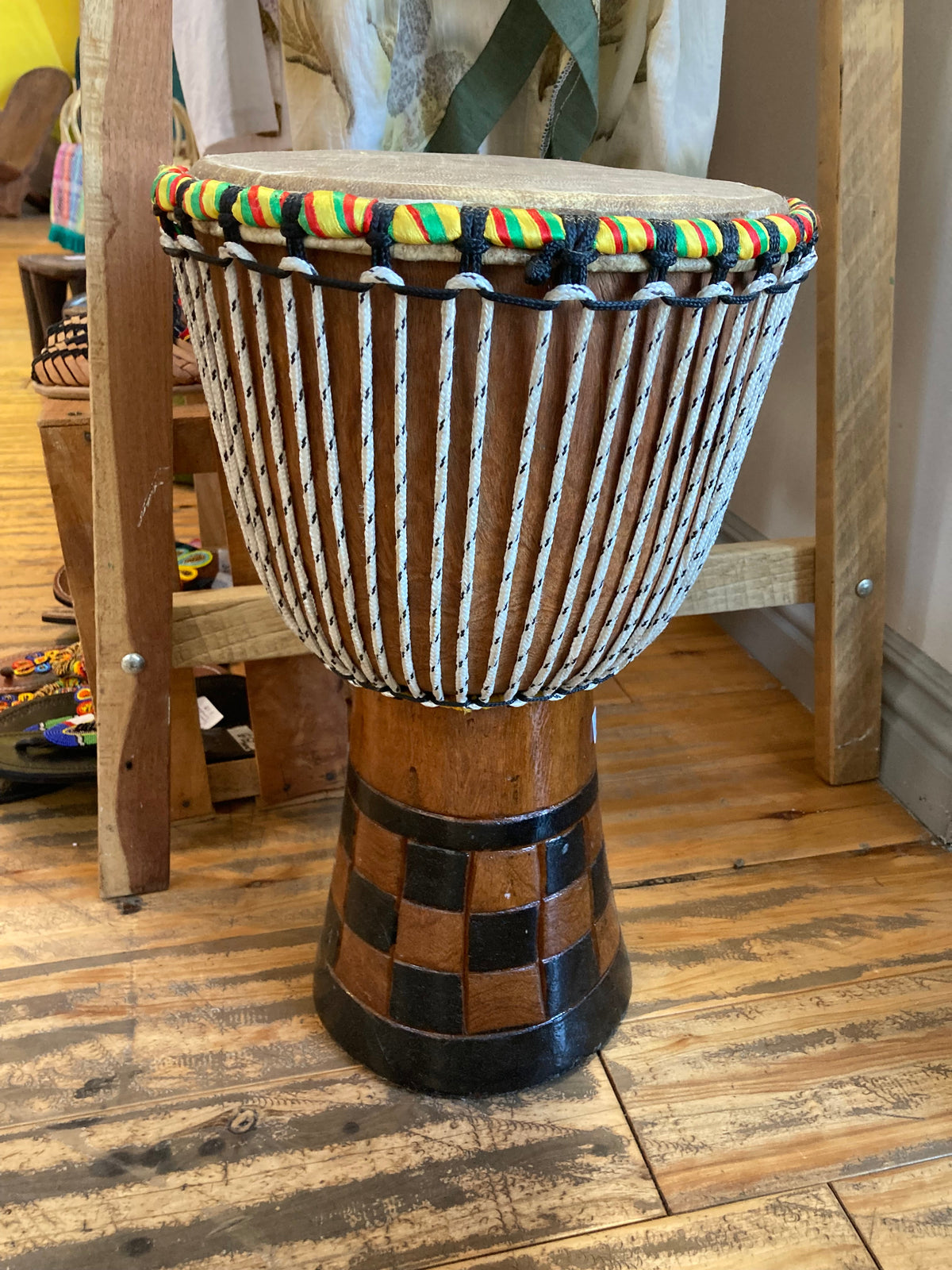 Teranga Africa/Choose Senegal hand-carved wooden djembe drum with goatskin head and colorful braided trim